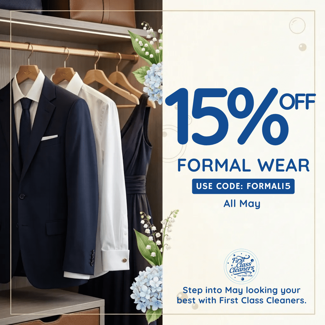 Clothes hanging on a rack next to a sign offering 15% off formal wear with code FORMAL15 at First Class Cleaners, valid throughout May.